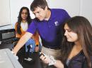 Working at the new ham radio station on campus, are (L – R) The University of Scranton sophomore Simal Sami; Assistant Professor Nathaniel Frissell, W2NAF, and junior Veronica Romanek. [Photo courtesy of The University of Scranton]